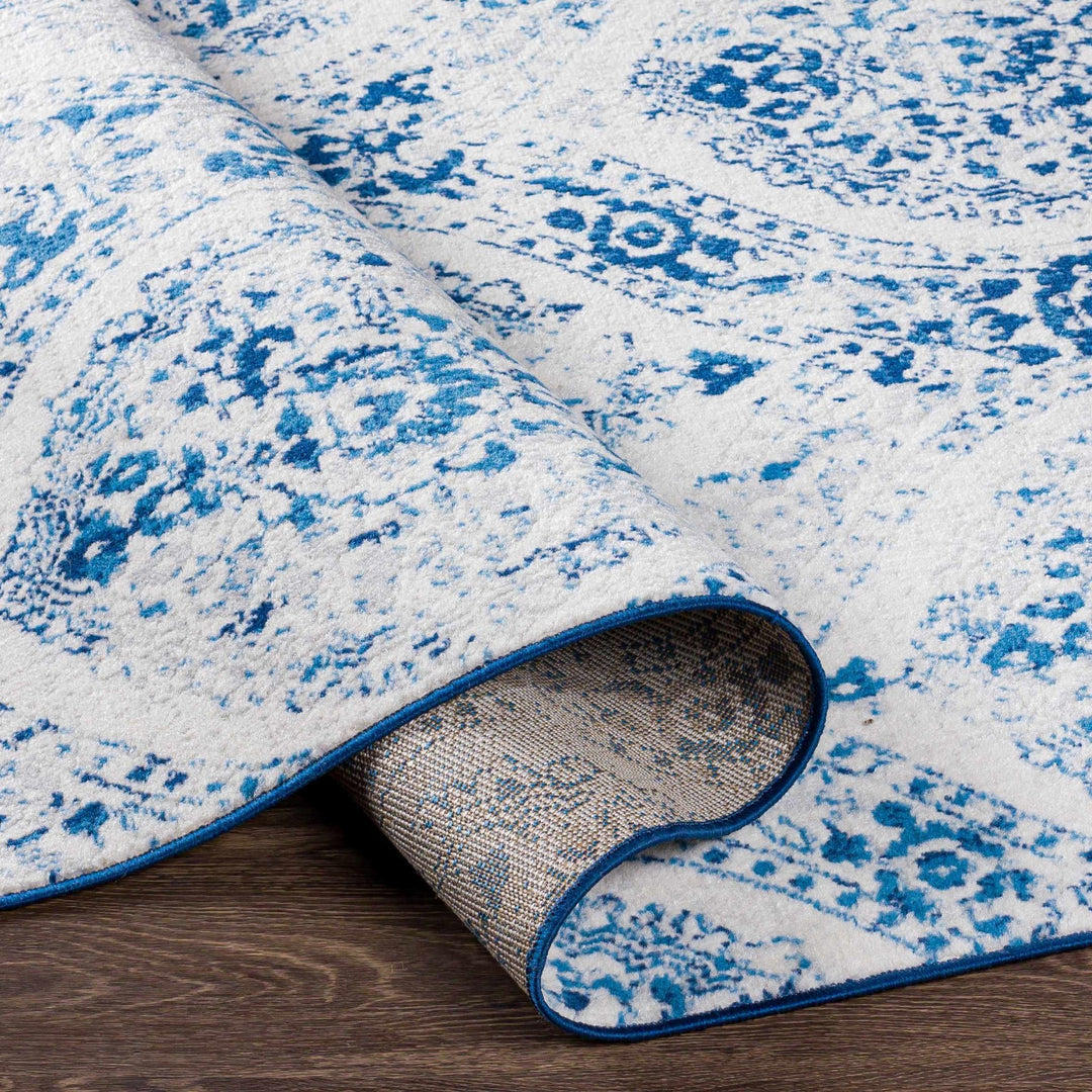 Penrhyndeudraeth Traditional Style Blue And Ivory Area Rug - The Rug Decor