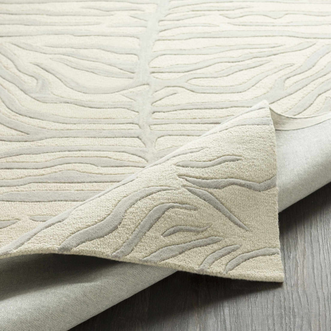 Peora Zebra Print Ivory And Gray Hand Tufted Wool Area Rug - The Rug Decor