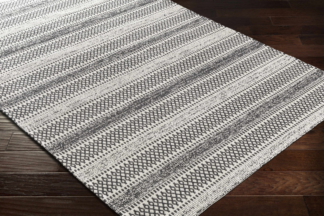 Planada Ivory And Black Modern Style Washable Area Rug - The Rug Decor