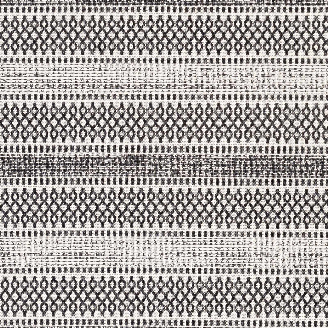 Planada Ivory And Black Modern Style Washable Area Rug - The Rug Decor