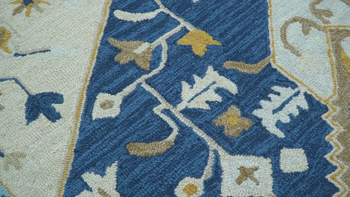 Ollie Traditional Blue And Ivory Hand Tufted Wool Rug