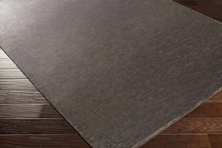 Taupe solid area rug, modern rectangle with visible woven edge