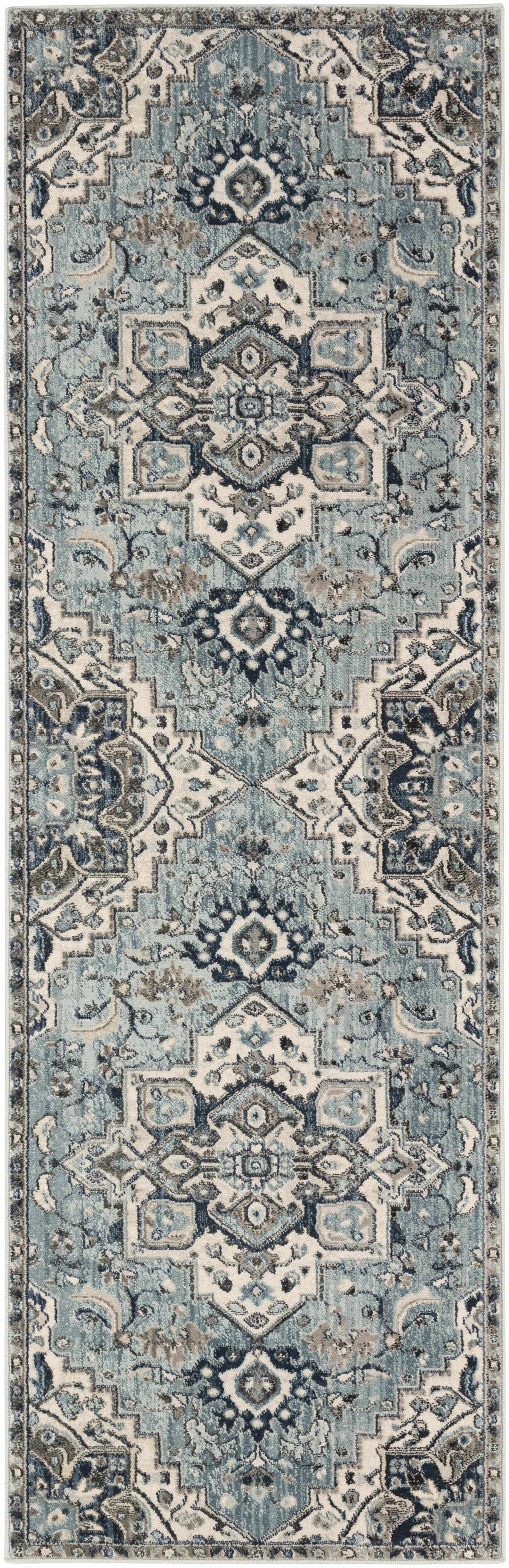 Pukwana Traditional Style Blue And Ivory Area Rug