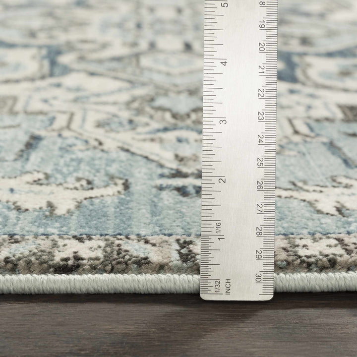 Pukwana Traditional Style Blue And Ivory Area Rug
