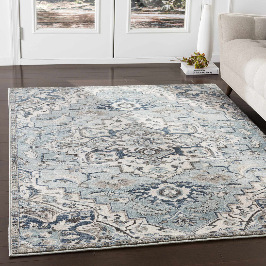 Pukwana Traditional Style Blue And Ivory Area Rug