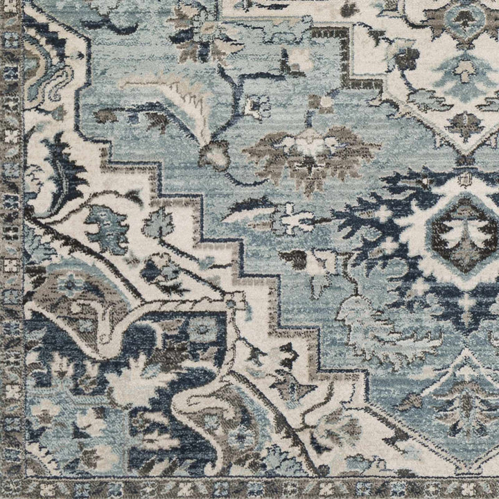 Pukwana Traditional Style Blue And Ivory Area Rug