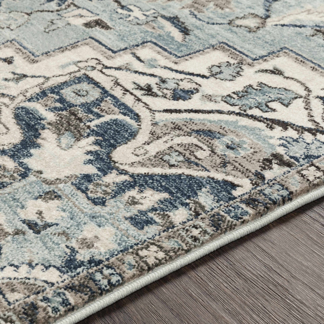 Pukwana Traditional Style Blue And Ivory Area Rug - The Rug Decor