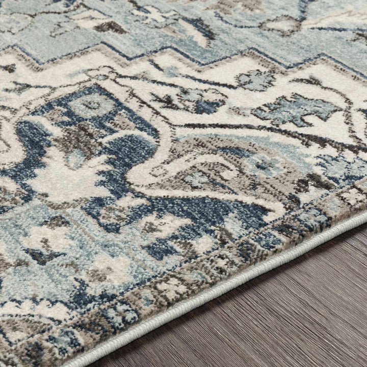 Pukwana Traditional Style Blue And Ivory Area Rug - The Rug Decor