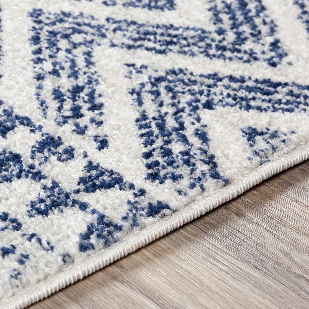 Renick Modern Style Blue And Ivory Area Rug - The Rug Decor