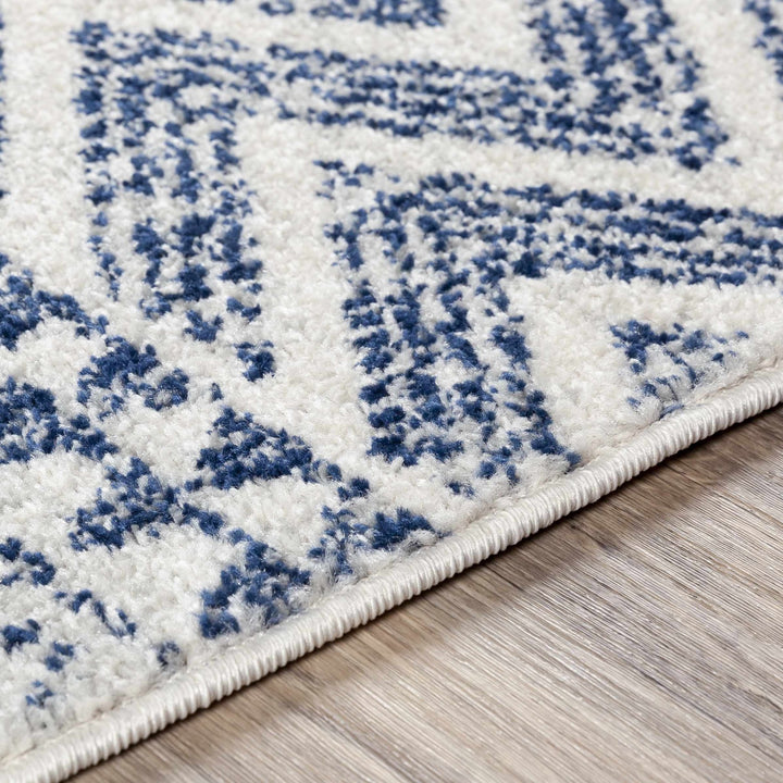 Renick Modern Style Blue And Ivory Area Rug - The Rug Decor