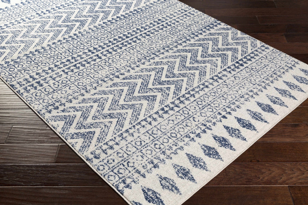 Renick Modern Style Blue And Ivory Area Rug - The Rug Decor