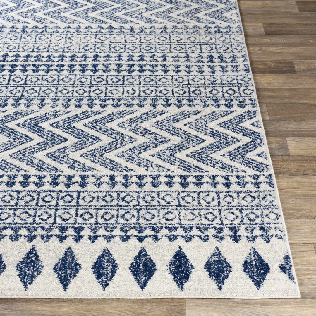 Renick Modern Style Blue And Ivory Area Rug - The Rug Decor