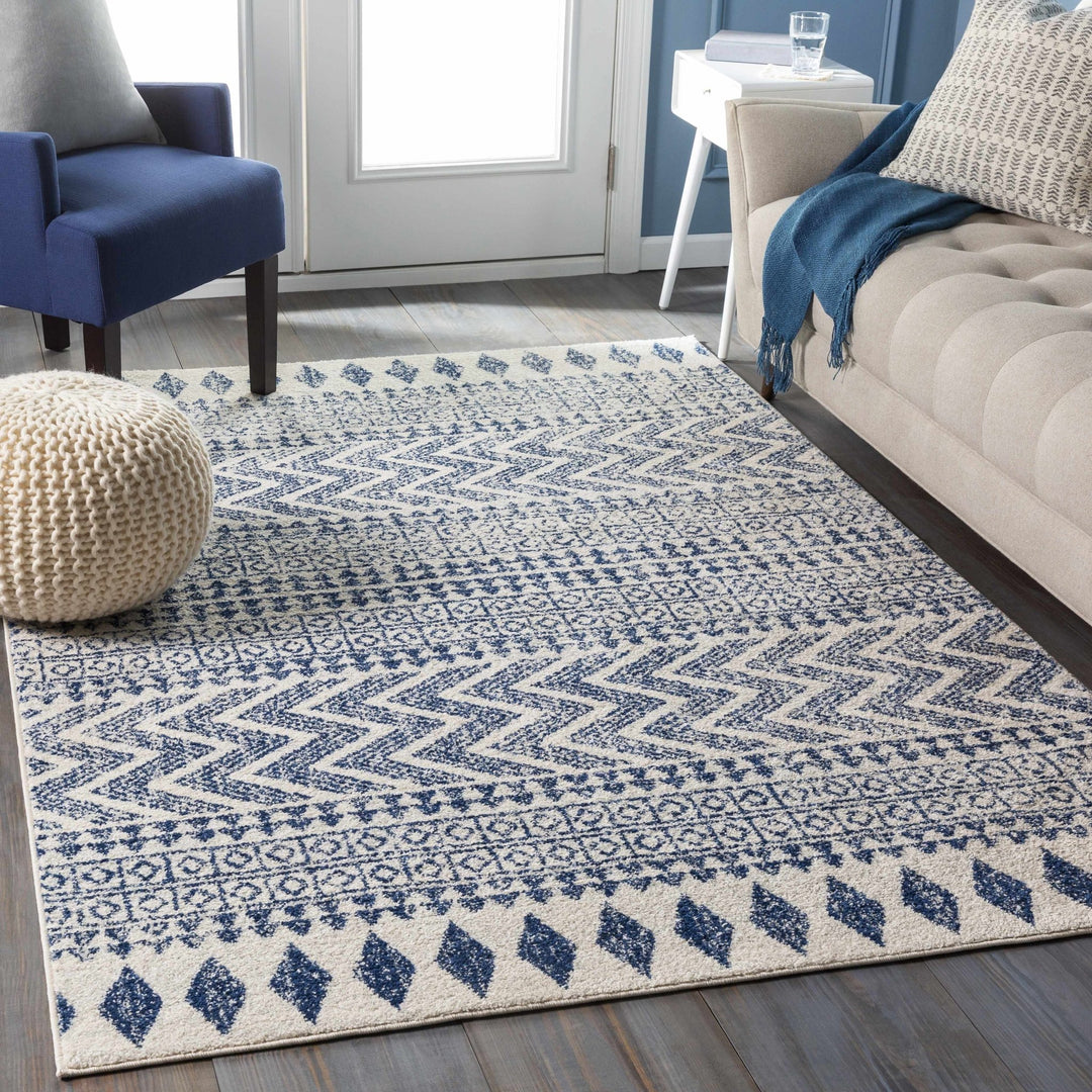 Renick Modern Style Blue And Ivory Area Rug - The Rug Decor