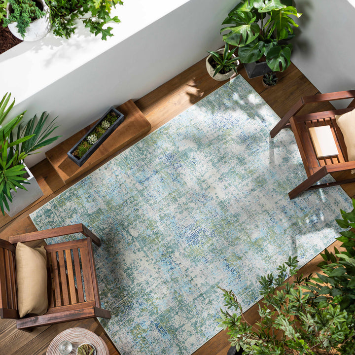 Riegelwood Modern Abstract Design Teal And Ivory Outdoor Rug