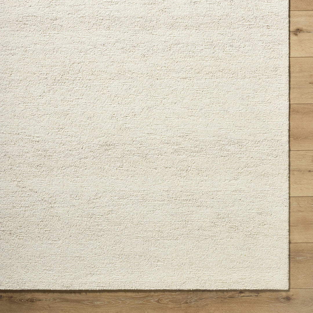 Sevan Modern Solid Design Ivory Hand Tufted Wool Rug - The Rug Decor