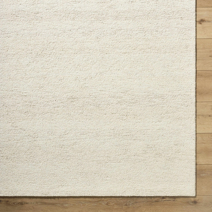 Sevan Modern Solid Design Ivory Hand Tufted Wool Rug - The Rug Decor