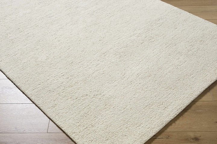 Sevan Modern Solid Design Ivory Hand Tufted Wool Rug - The Rug Decor