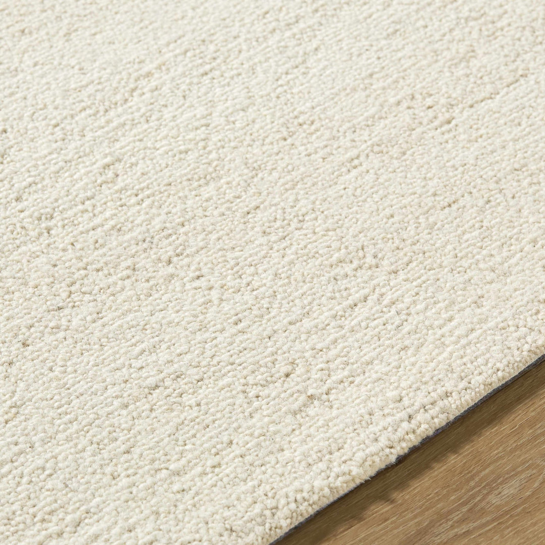 Sevan Modern Solid Design Ivory Hand Tufted Wool Rug - The Rug Decor
