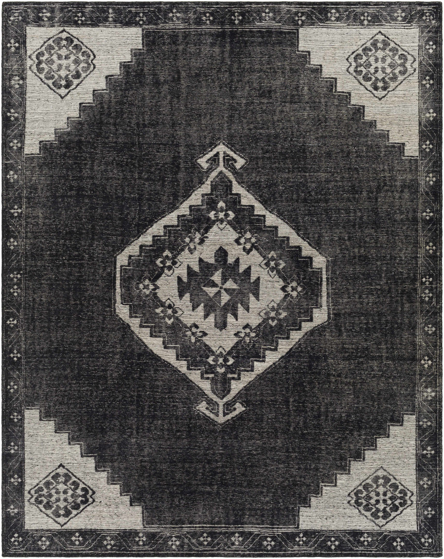 Traditional hand-knotted wool area rug with black and ivory geometric medallion