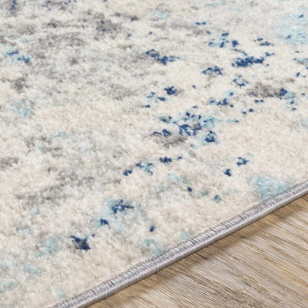 Slamannan Ivory And Blue Modern Abstract Design Area Rug - The Rug Decor