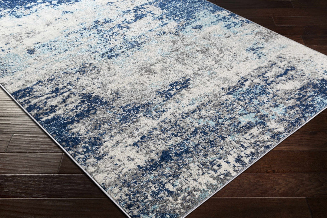 Slamannan Ivory And Blue Modern Abstract Design Area Rug - The Rug Decor