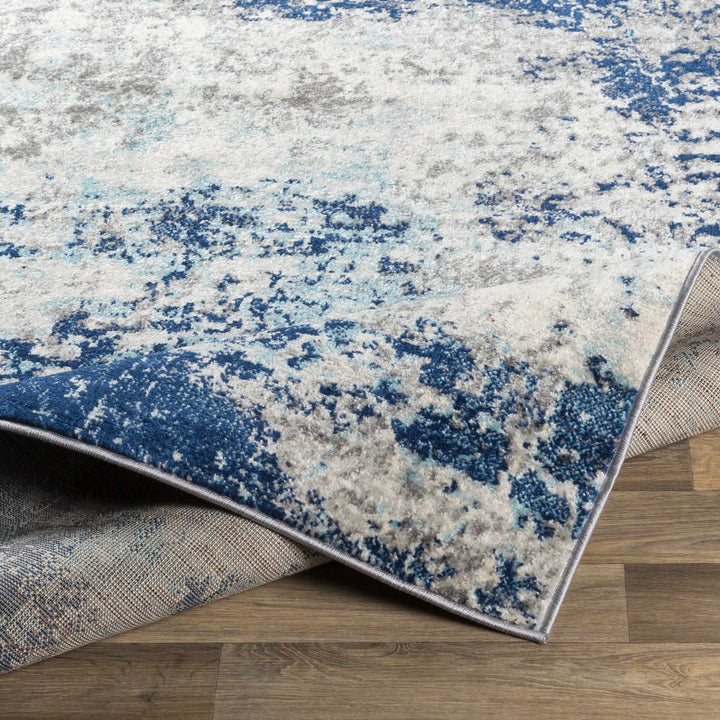 Slamannan Ivory And Blue Modern Abstract Design Area Rug - The Rug Decor