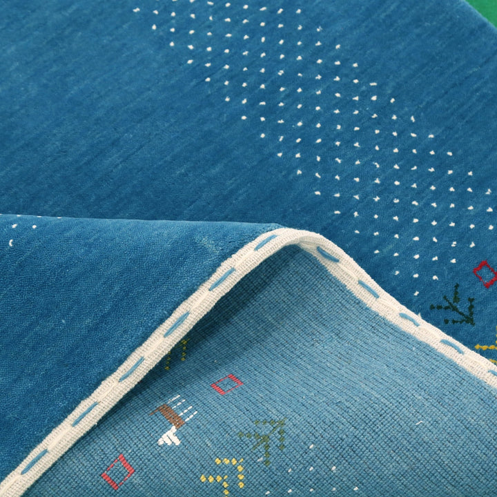 Solid Blue Border Design Hand Loomed Wool Area Rug - The Rug Decor