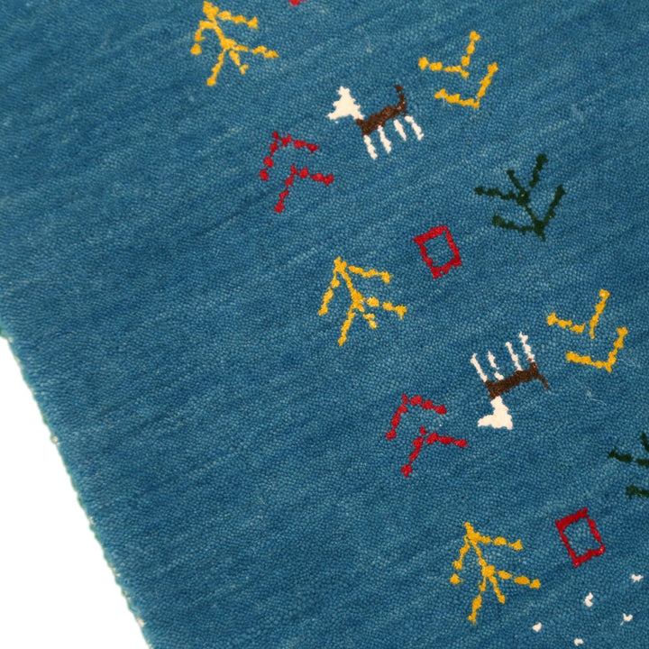 Solid Blue Border Design Hand Loomed Wool Area Rug - The Rug Decor