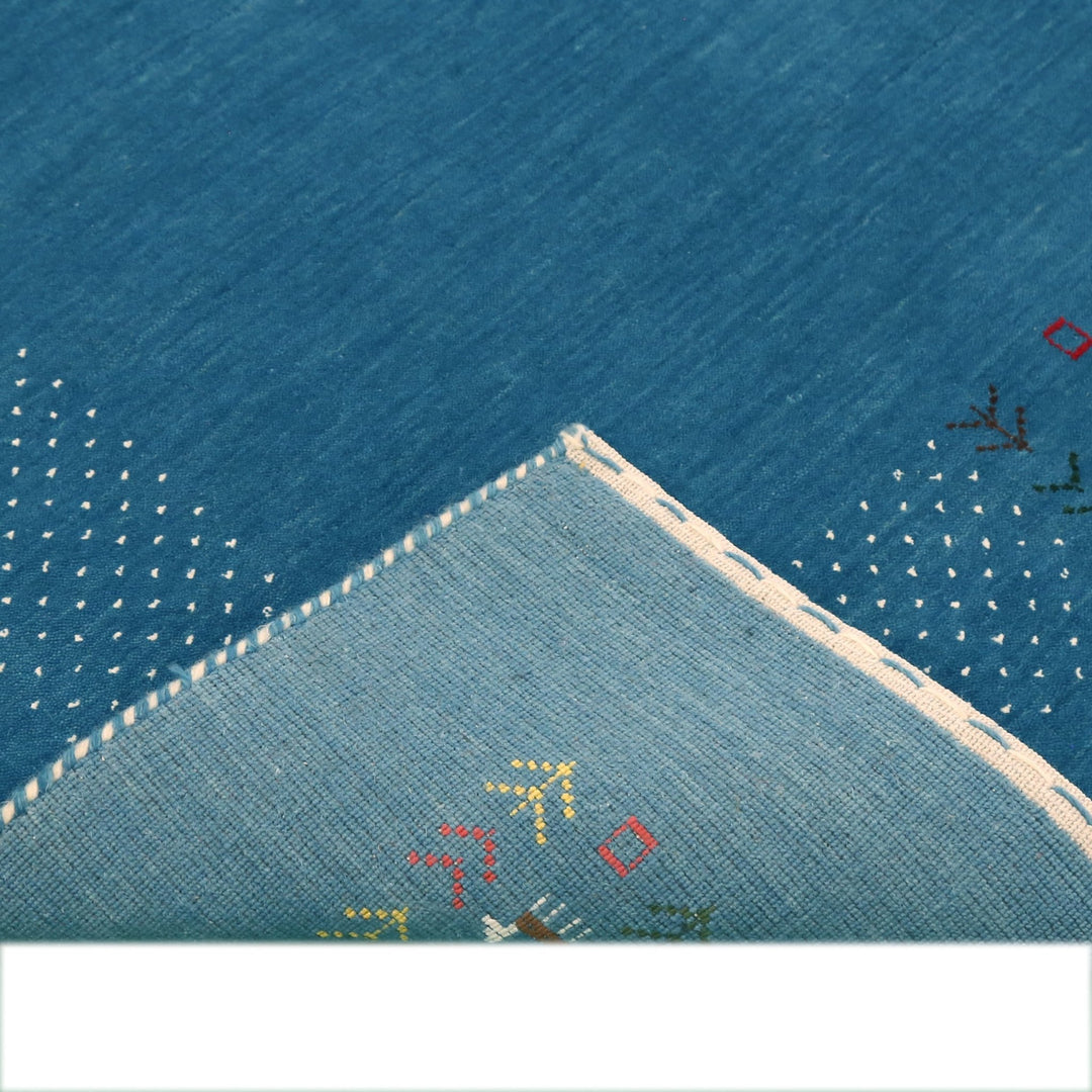 Solid Blue Border Design Hand Loomed Wool Area Rug - The Rug Decor