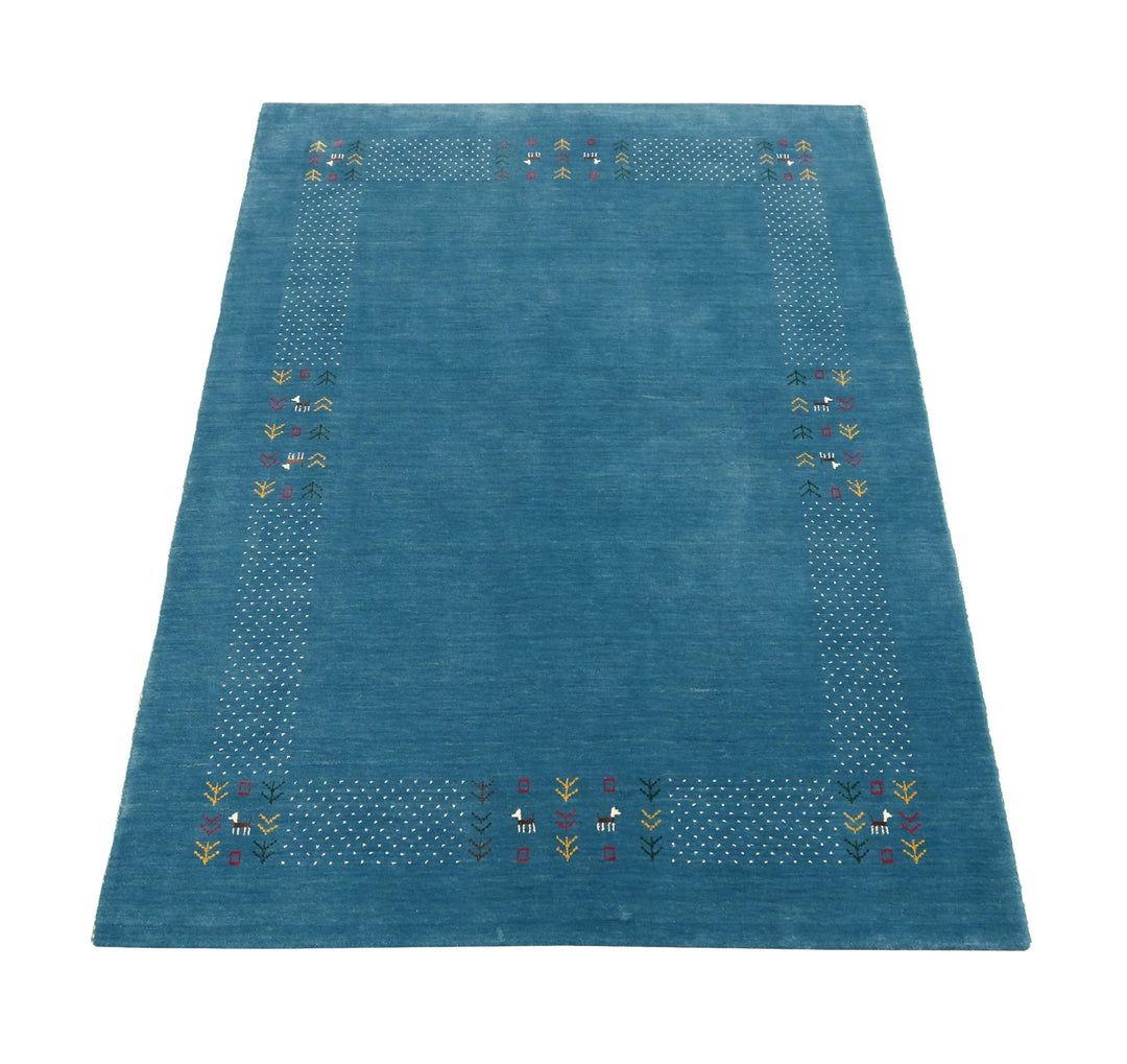 Solid Blue Border Design Hand Loomed Wool Area Rug - The Rug Decor