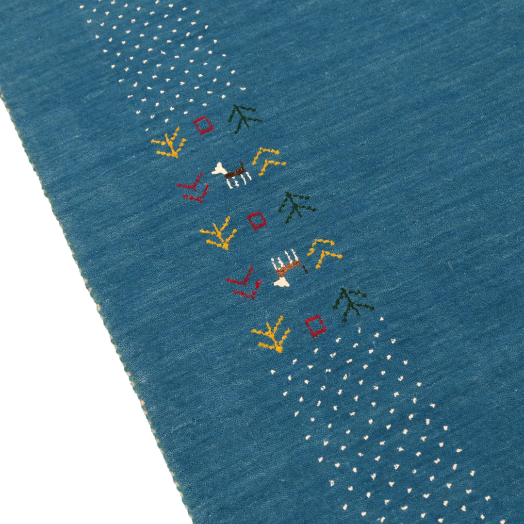Solid Blue Border Design Hand Loomed Wool Area Rug - The Rug Decor