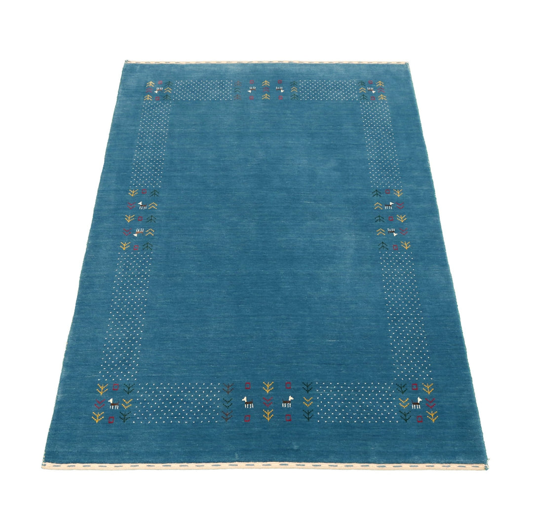 Solid Blue Border Design Hand Loomed Wool Area Rug - The Rug Decor