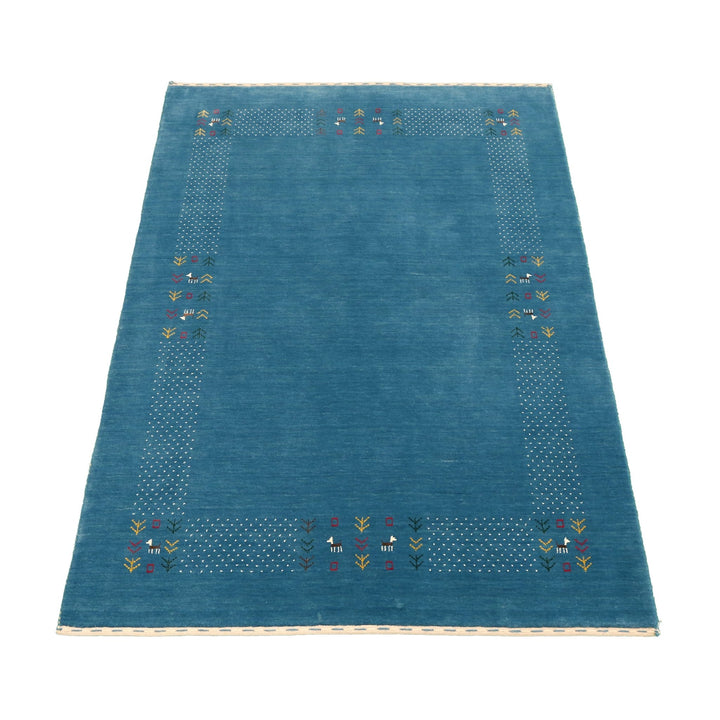 Solid Blue Border Design Hand Loomed Wool Area Rug - The Rug Decor