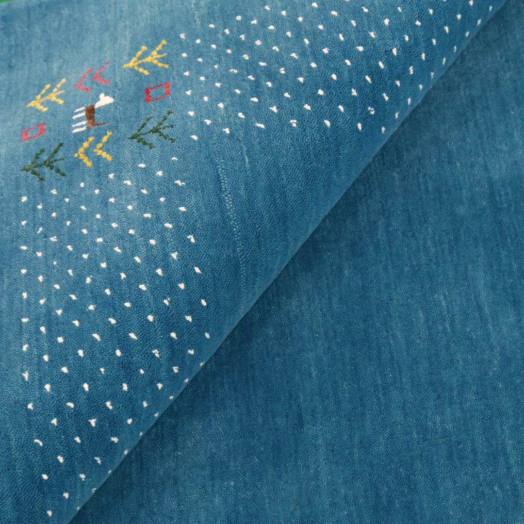Solid Blue Border Design Hand Loomed Wool Area Rug - The Rug Decor