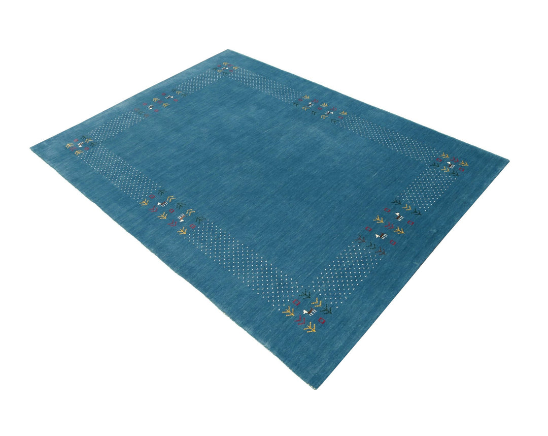 Solid Blue Border Design Hand Loomed Wool Area Rug - The Rug Decor