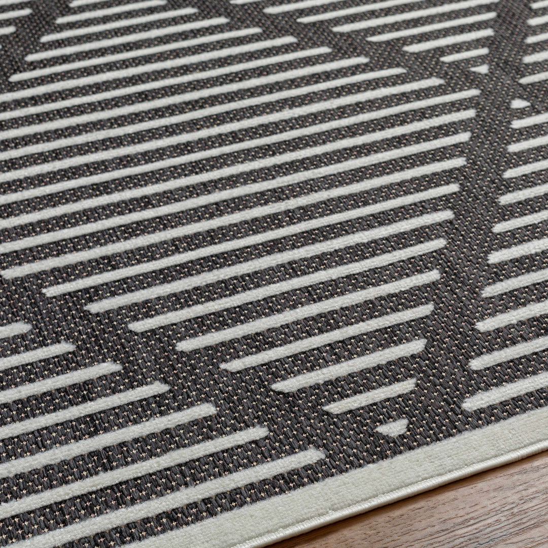 Anah Geometrical Black And Ivory Outdoor Rug