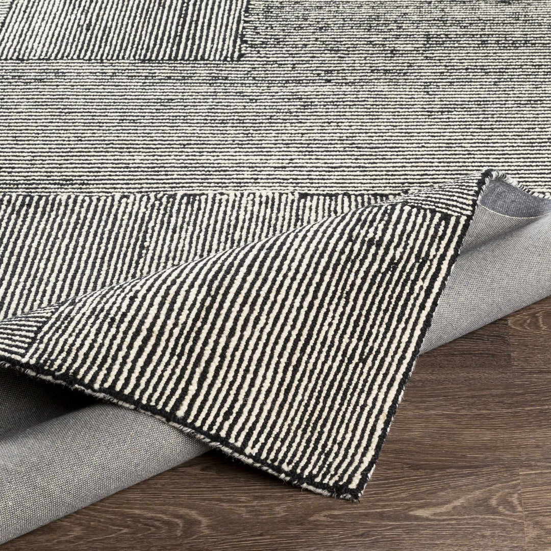 Stevington Transitional Black And Ivory Wool Area Rug - The Rug Decor