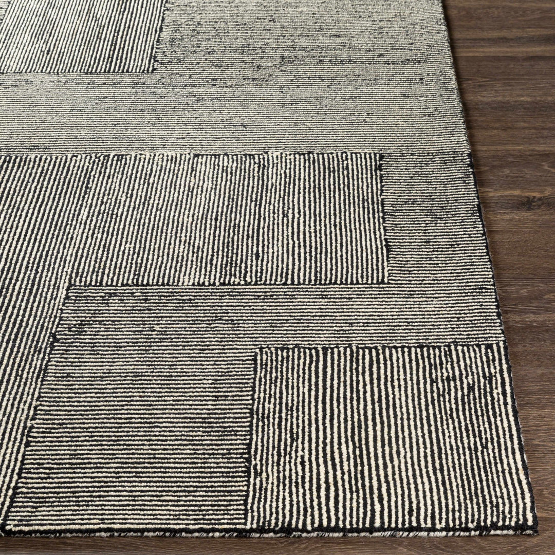 Stevington Transitional Black And Ivory Wool Area Rug - The Rug Decor