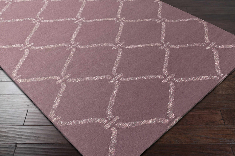 Purple hand-woven wool rug with raised diamond lattice pattern, corner view