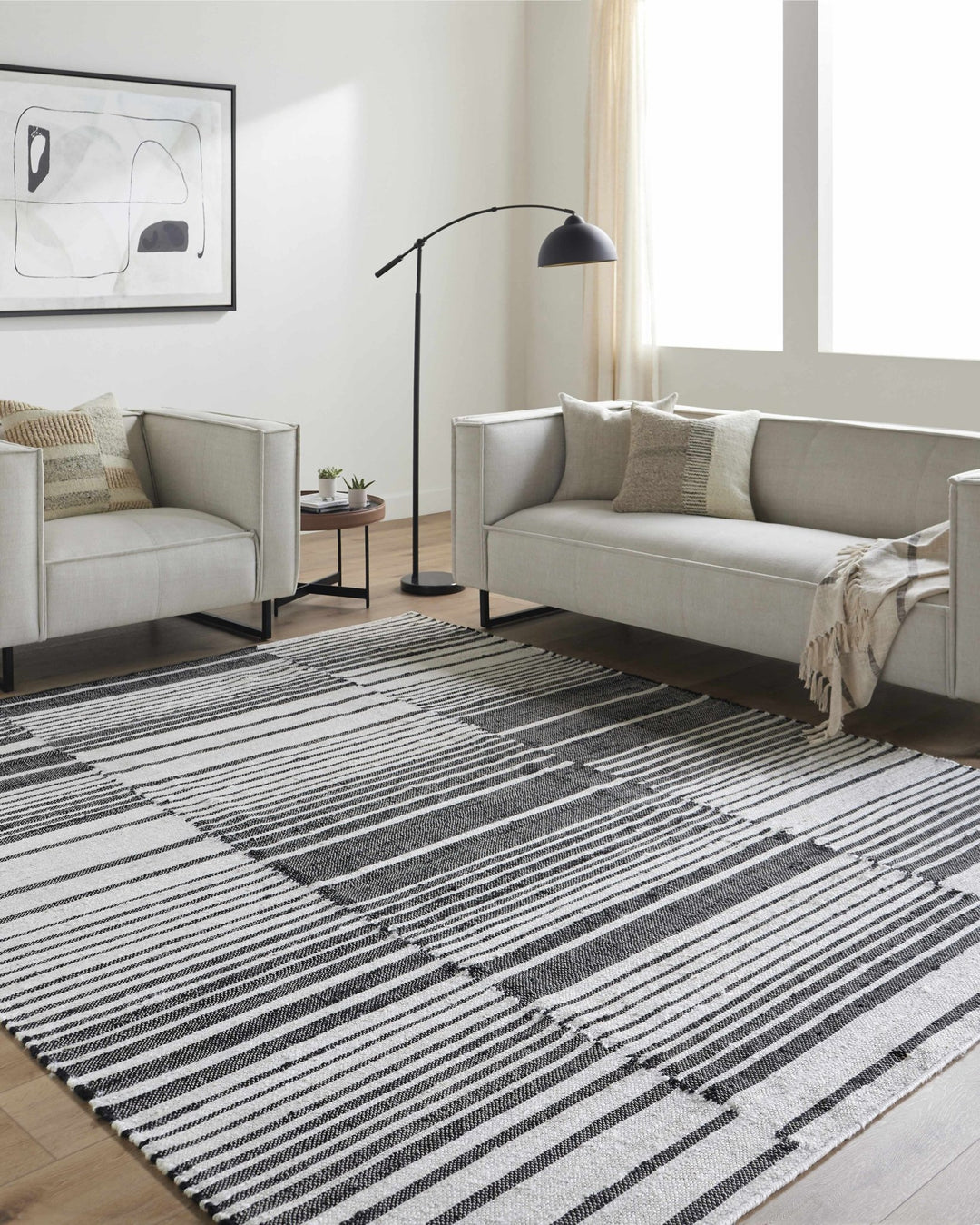 Tania Black And White Modern Stripes Pattern Hand Woven Area Rug - The Rug Decor