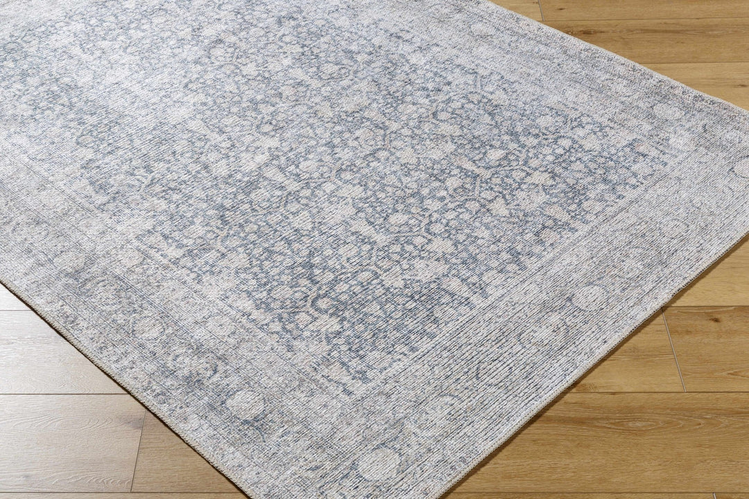 Thera Traditional Blue And Beige Washable Area Rug - The Rug Decor