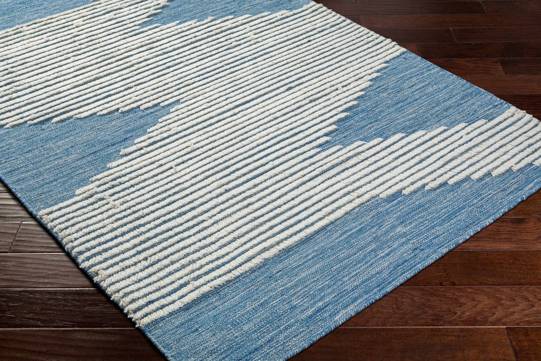 Thika Modern Blue and Ivory Area Rug - The Rug Decor
