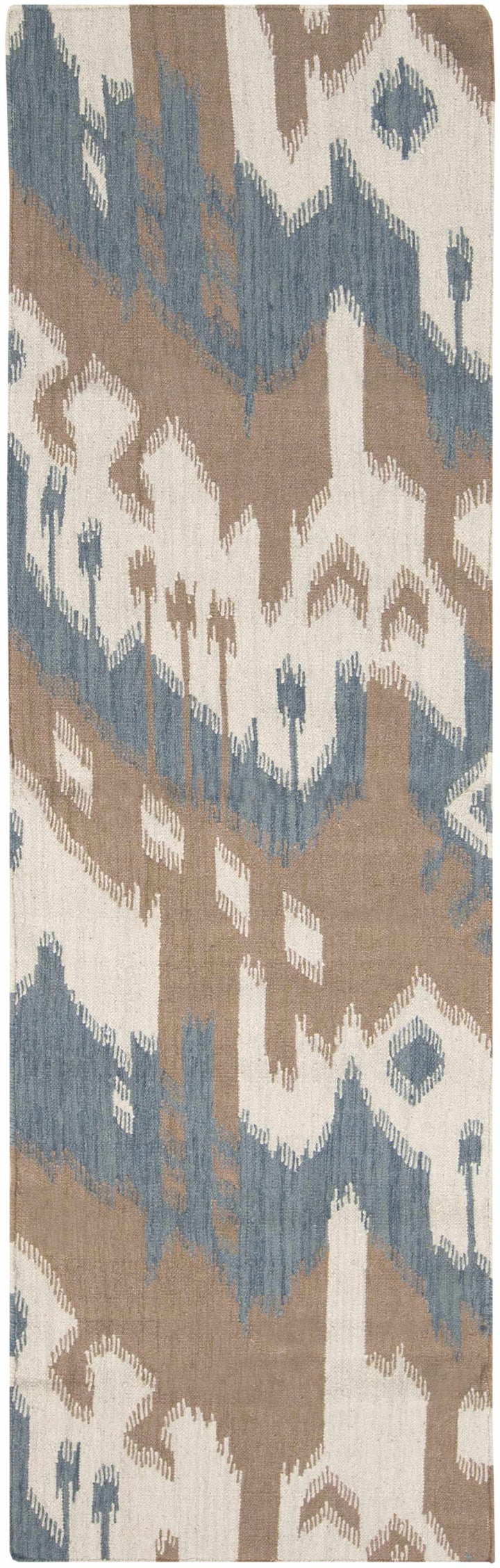 Runner-style area rug with blue and cream abstract ikat pattern in beige and brown