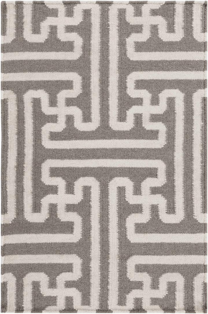 Gray and ivory geometric Greek-key rug, symmetrical central medallion close-up
