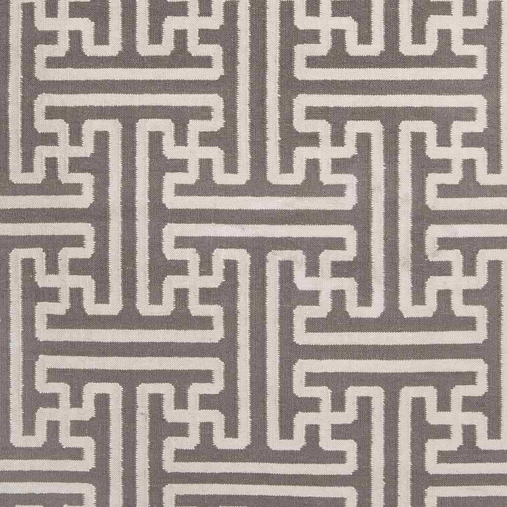 Gray and ivory Greek-key rug, tight close-up of repeating pattern and stripes