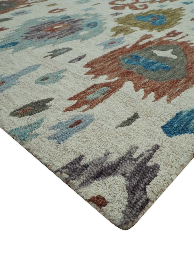 Traditional Ikat Design 5x8 Ivory, Brown and Aqua Hand Tufted wool area rug - The Rug Decor