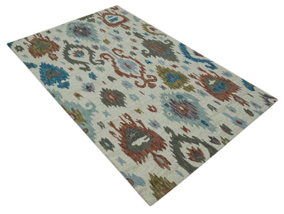 Traditional Ikat Design 5x8 Ivory, Brown and Aqua Hand Tufted wool area rug - The Rug Decor