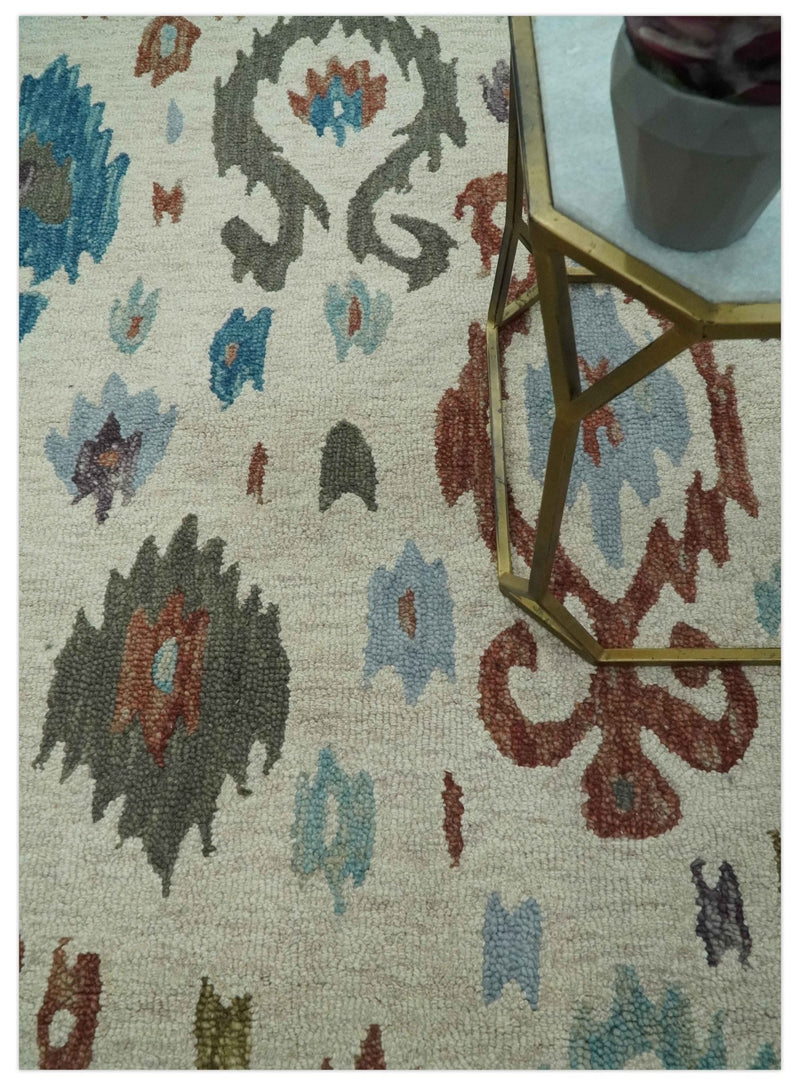 Traditional Ikat Design 5x8 Ivory, Brown and Aqua Hand Tufted wool area rug - The Rug Decor