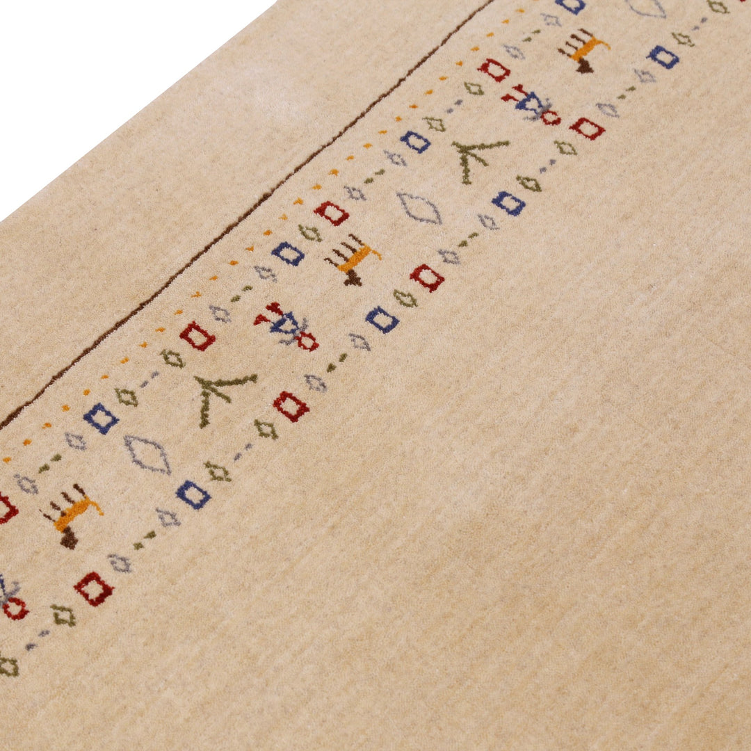 Tribal Border Ivory Design Hand Loomed Wool Area Rug - The Rug Decor