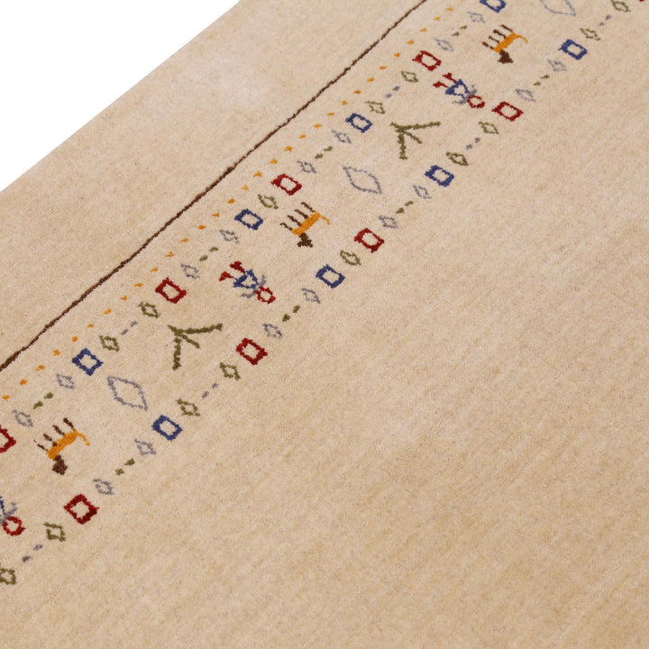 Tribal Border Ivory Design Hand Loomed Wool Area Rug - The Rug Decor